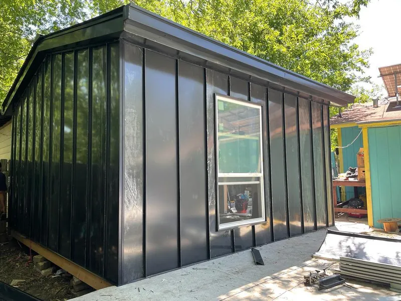 Black standing seam metal wall panels for Metal Roof Installation in McGregor