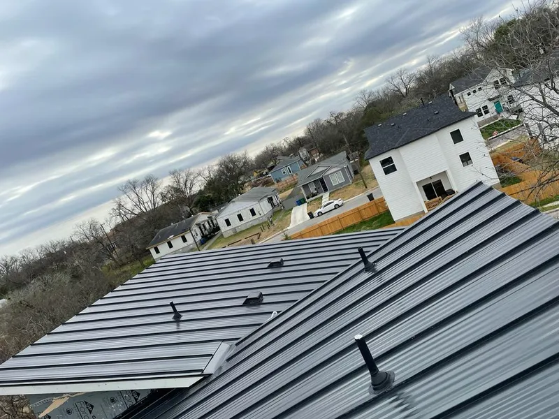 Standing seam metal roof panels with vents for Skylight Repair in McGregor